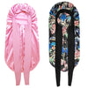 Pink satin sleep bonnet designed to protect and style curly hair