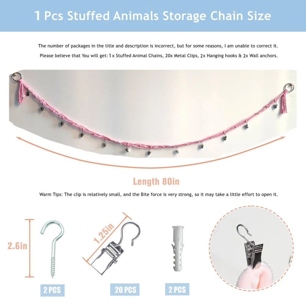 A close-up view of a pink stuffed animal storage chain with metal clips and hooks for hanging items.