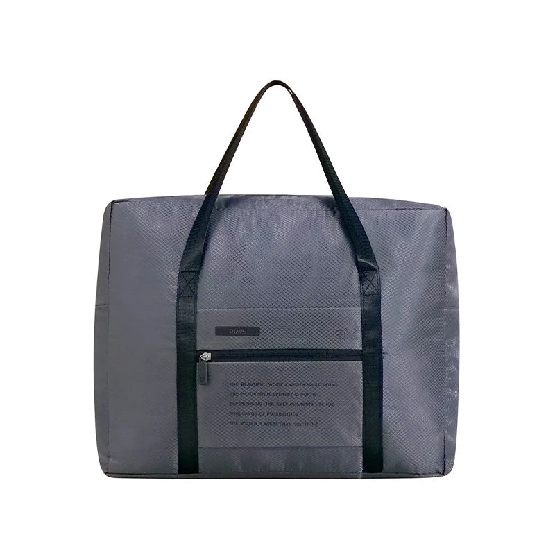 A dark gray foldable travel duffel bag with black straps and a zippered pocket on the front.