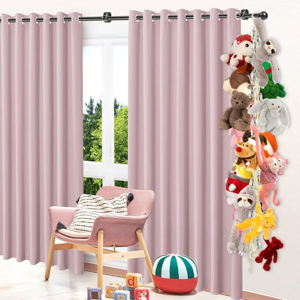 Pink curtains with bohemian cotton hanging storage chain featuring various stuffed animals