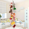 A white bedroom decorated with a hanging storage chain featuring stuffed animals and a toy car.
