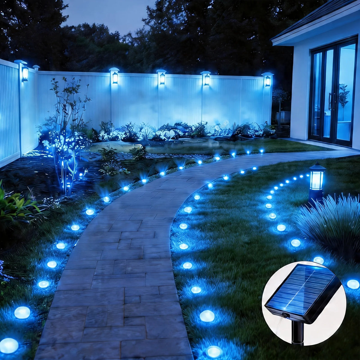 A curved stone pathway illuminated by blue LED lights in a garden setting.