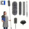 A collection of extendable microfiber dusters and brushes with telescopic poles, including fluffy and cylindrical types.