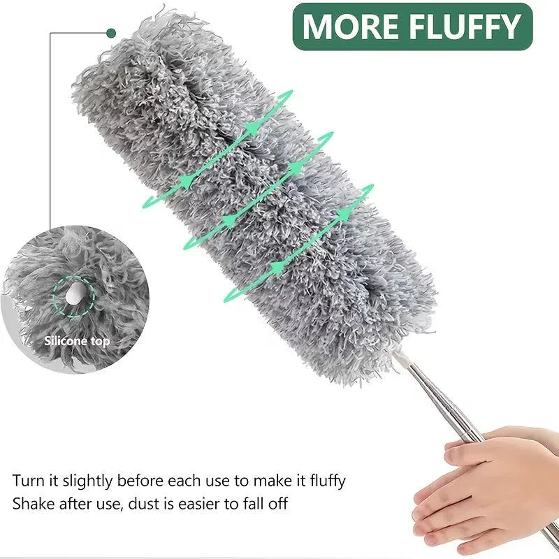 A close-up view of a grey telescopic duster with a silicone top, showing fibers and an instruction to make it fluffy.