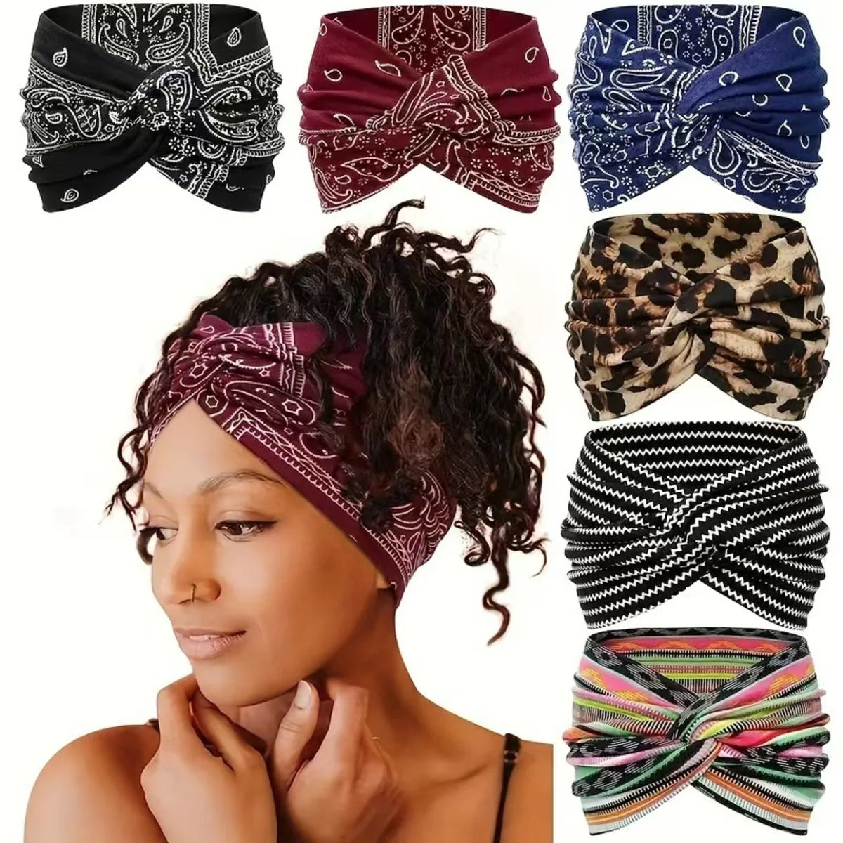 A woman wearing a patterned elastic knot yoga and fitness headband with dark curly hair.