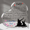 A heart-shaped acrylic keepsake plaque for Father's Day with a silhouette of a father and child.