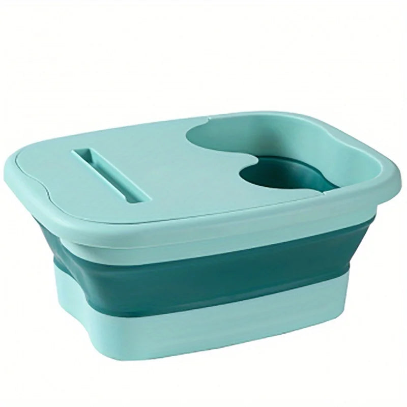 A light blue collapsible foot soak bucket with massage dots.