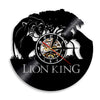 Black vinyl record wall clock featuring a lion's head silhouette and a clock face.
