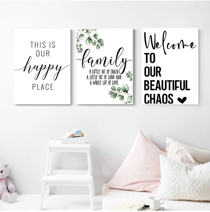 Three framed canvas prints featuring happy family quotes and green leaves for wall decor