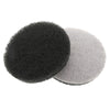 Two circular scouring pads, one black and one gray, are shown against a white background.
