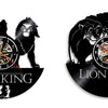Four album covers featuring Lion King and Zuka Zama artwork on vinyl record wall clocks.