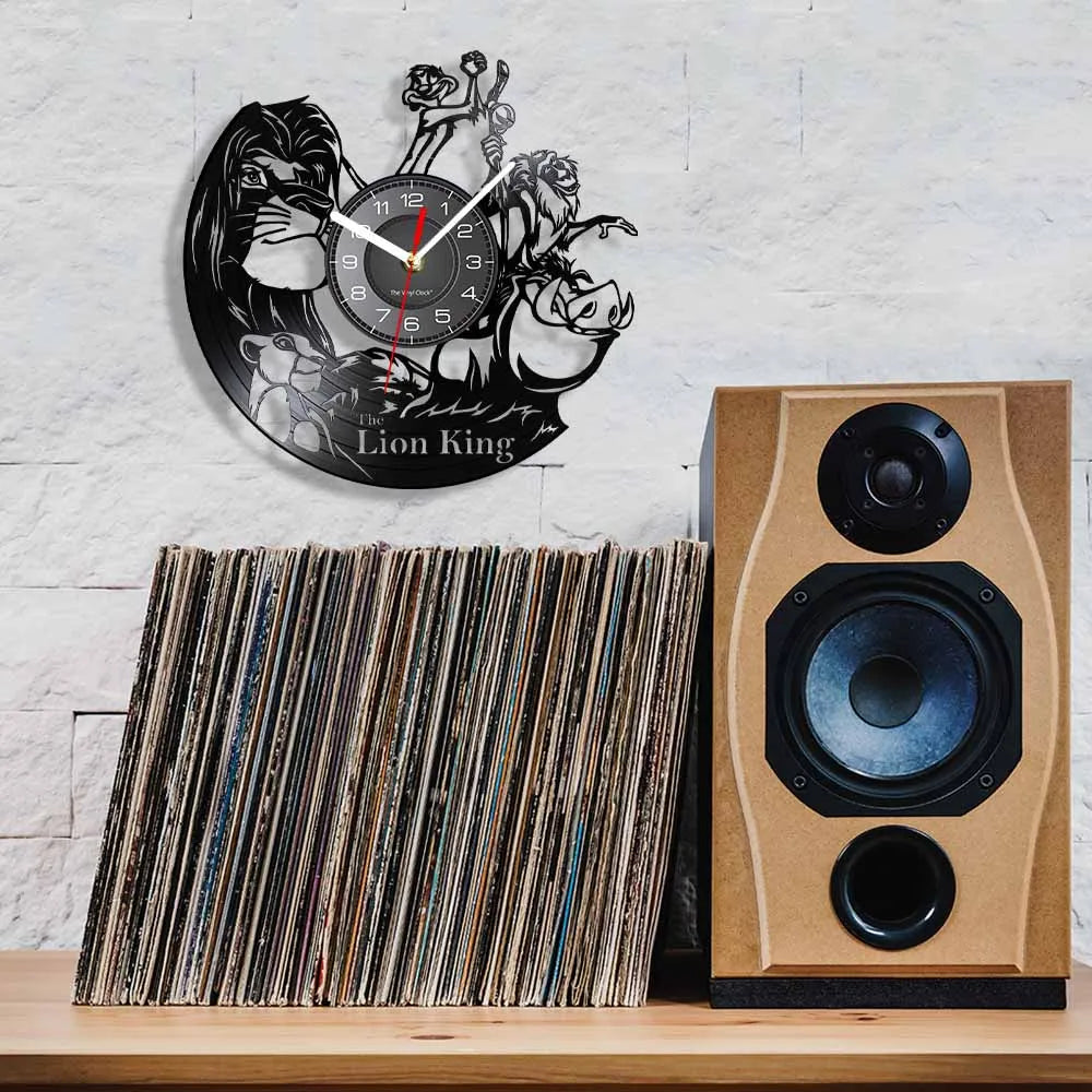 A wall clock shaped like a lion with a face and a vinyl record display, positioned above a stack of vinyl records.
