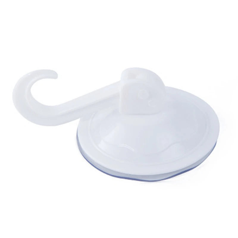 A white suction cup hook with a curved handle used for non-drill wall mounting.