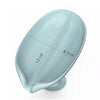 Light blue leaf-shaped suction cup soap holder with a self-draining tray and measurement lines.