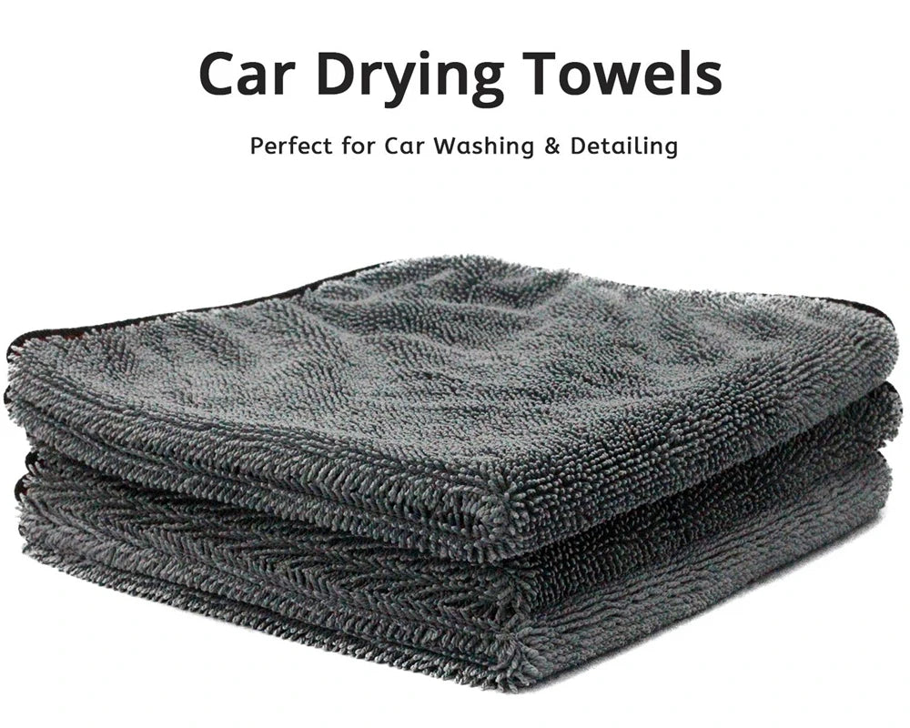 A stack of dark gray ultra-soft microfiber car drying towels.
