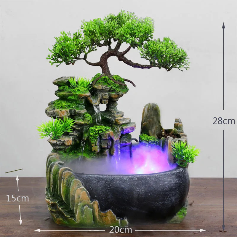 A resin water fountain featuring a mossy rock structure and green foliage with purple illuminated water.
