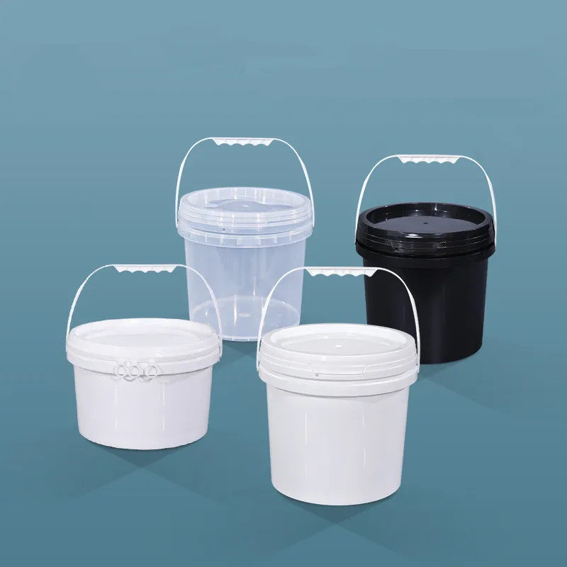 A set of two clear and black leakproof food grade storage buckets with lids on a blue background.