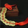 Handmade red knot feng shui coins for prosperity on a string