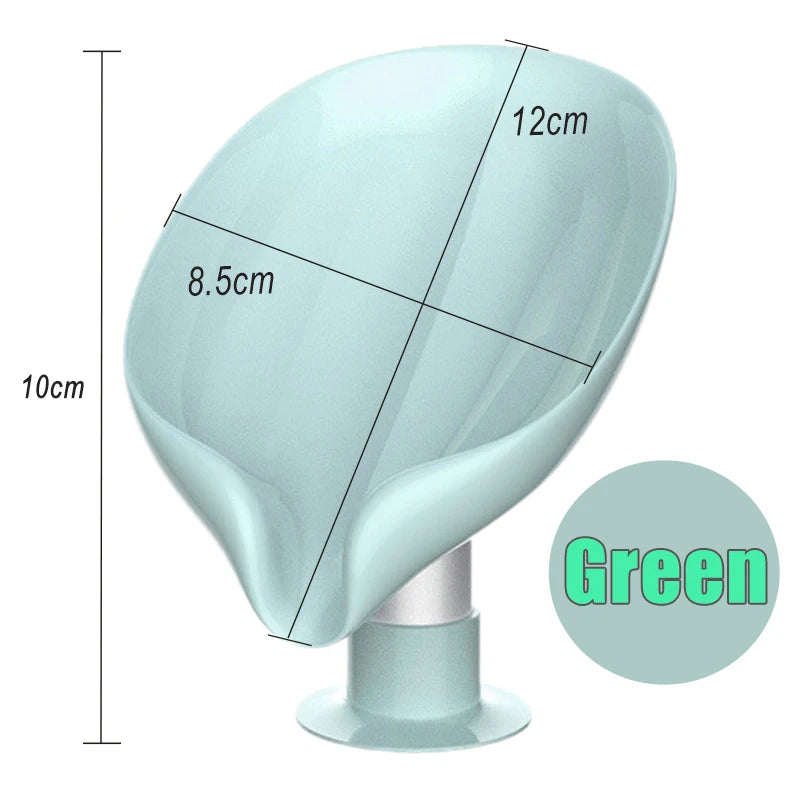 A light green leaf-shaped suction cup soap dish shown from the side with dimensions marked.