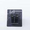 A black wall mounted organizer with slots for cups and toothbrushes.