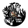A black vinyl record wall clock featuring a stylized animal design and a clock face.
