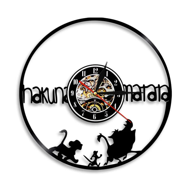 A black vinyl record wall clock with a white face and gold-colored hands displaying the time.