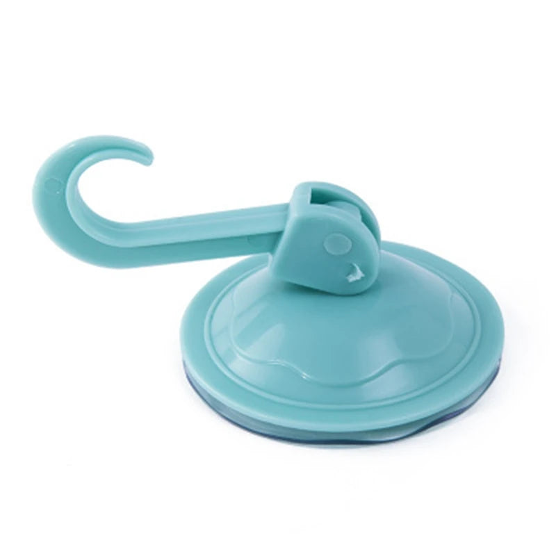 A light blue suction cup hook with a curved handle and flat base for hanging items.