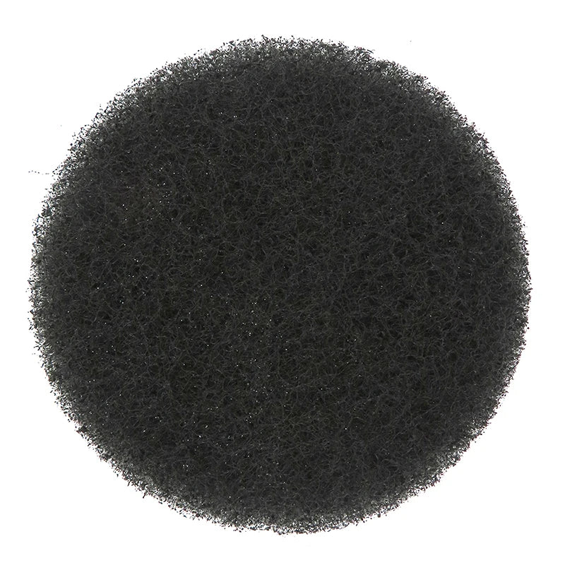 A circular view of a black, porous scouring pad product.