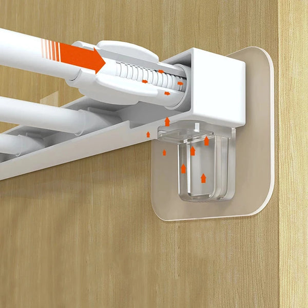 White adhesive shelf support pegs being inserted into a cabinet or closet shelf.