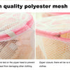Close-up of a pink polyester mesh bag used for storing bandages, showing the zipper closure.