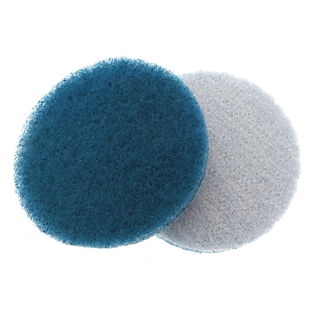 Two circular scouring pads, one blue and one gray, are shown against a white background.