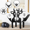 Black novelty animal toilet paper holder and storage rack featuring a deer head design.
