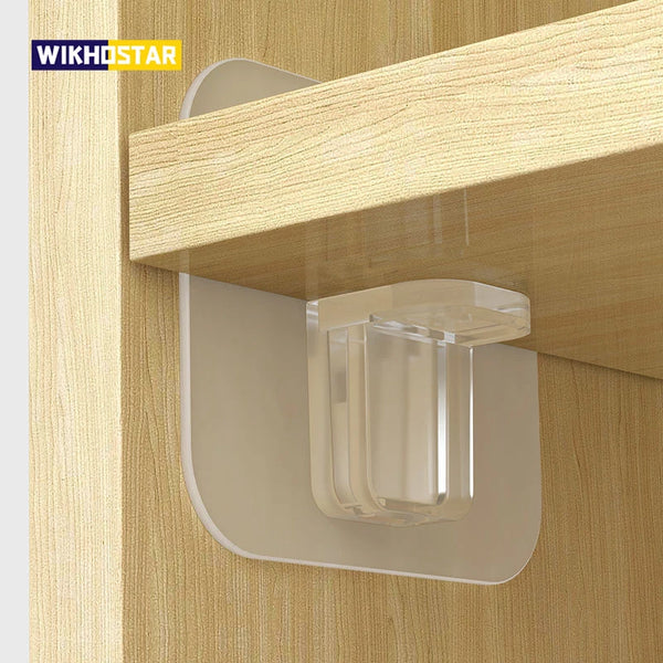Clear adhesive shelf support pegs mounted on a wooden cabinet or closet panel.