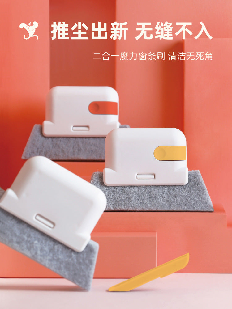 A white window and gap cleaning brush is shown resting on gray foam pads in an orange display setting.