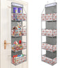 A tall, vertical over-the-door fabric storage organizer with multiple clear pockets for small items.