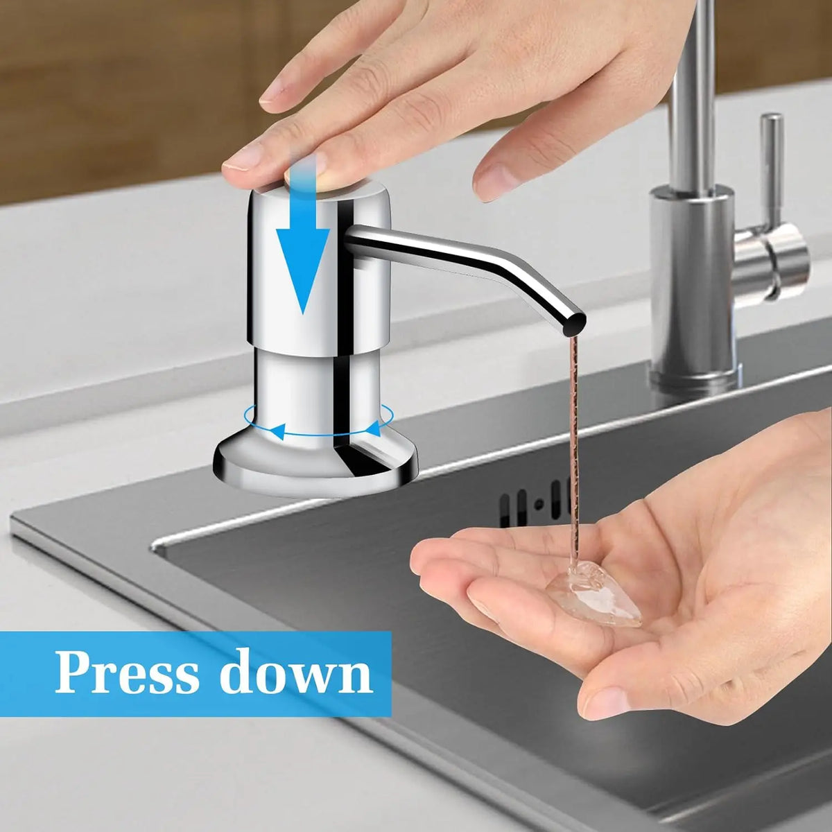 A hand is pressing down on a stainless steel liquid soap dispenser attached to a kitchen faucet.