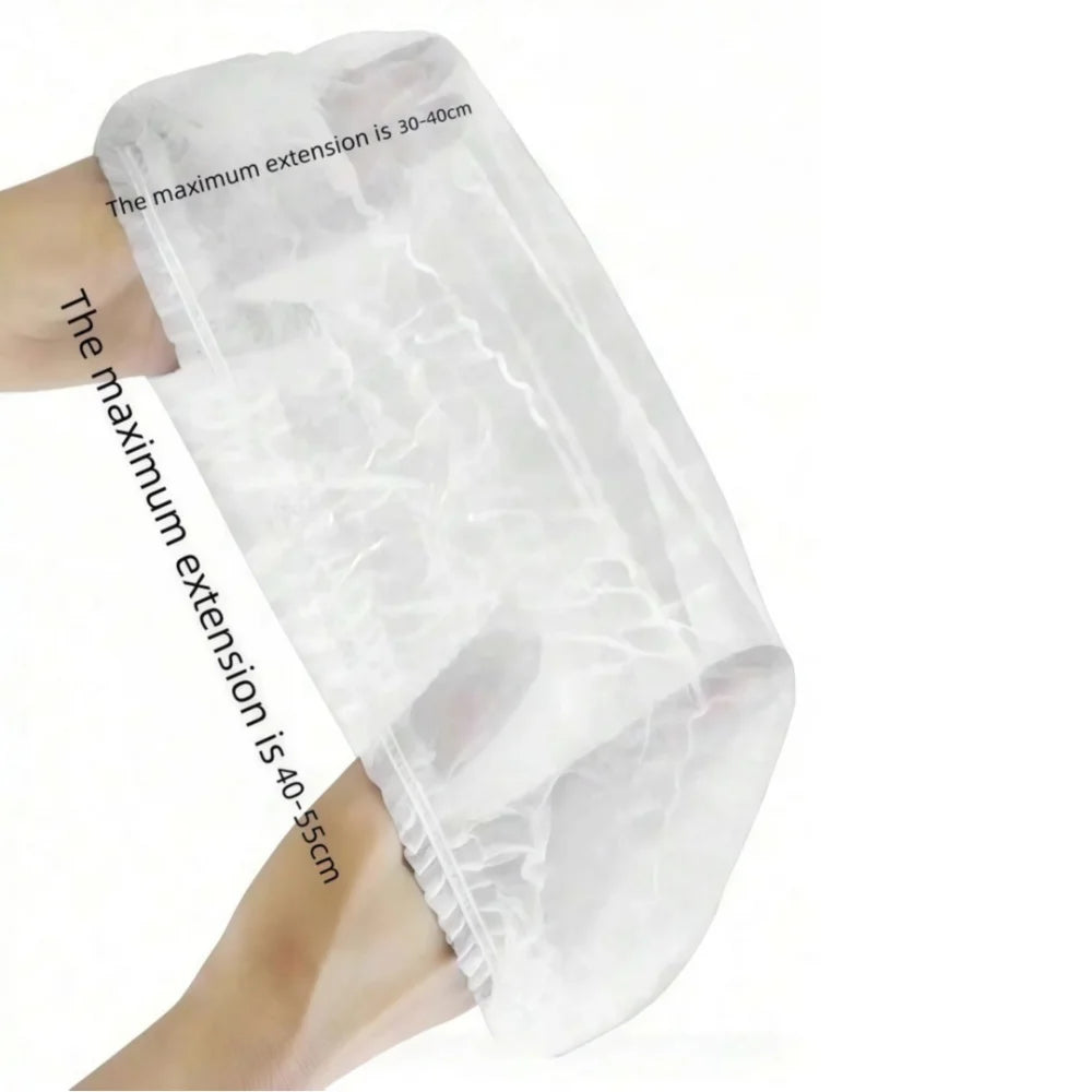 A translucent plastic disposable broom cover is shown being extended on a hand, with measurements indicating maximum extensio