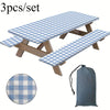A set of three plaid tablecloths and a storage bag for outdoor use.