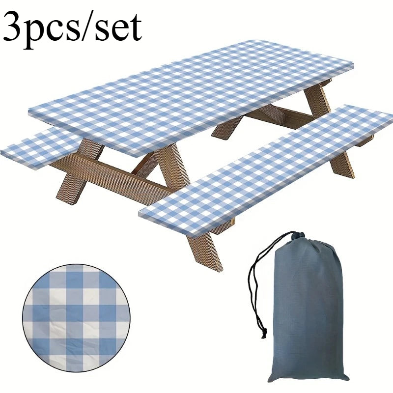 A set of three plaid tablecloths and a storage bag for outdoor use.