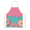 Pink apron featuring a bright teal background and colorful donut graphics.