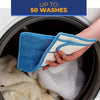 A hand is placing a blue microfiber mop pad into a washing machine drum, with white cleaning cloths visible inside.