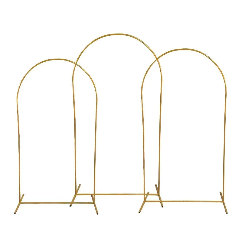 Three adjustable gold arch stands for party decor