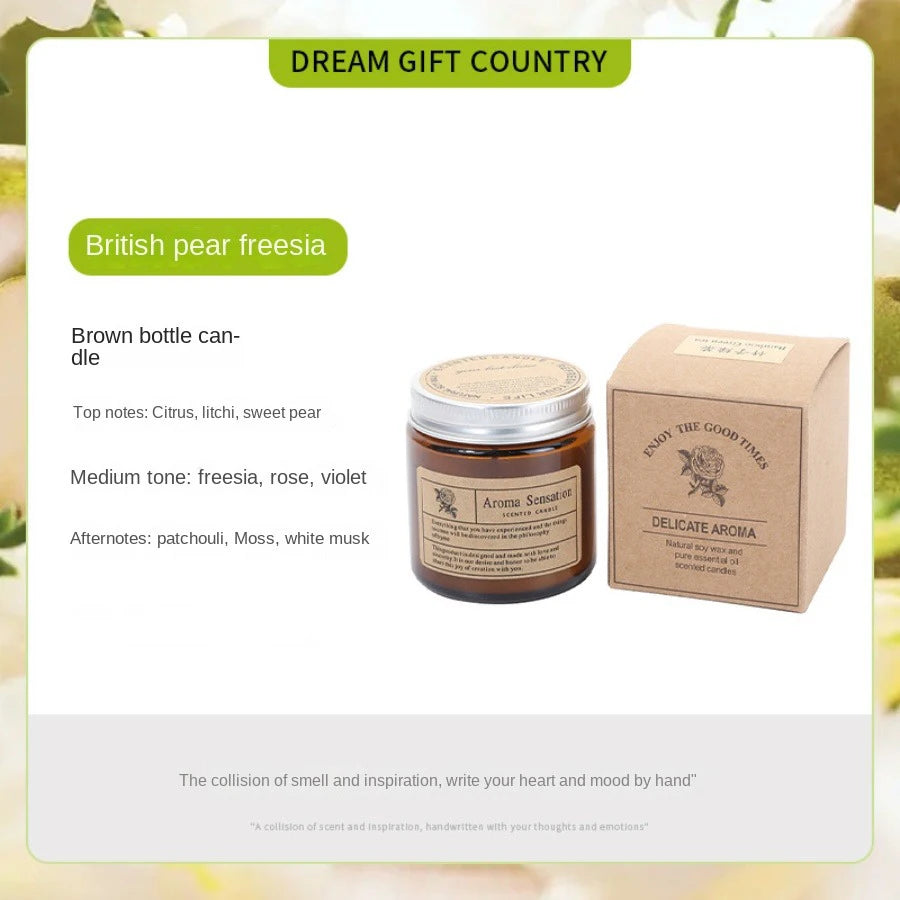 A brown bottle candle labeled British pear freesia with a box packaging for a dream gift country product