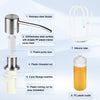 Components of an under-sink kitchen soap dispenser including a stainless steel nozzle, plastic pump core, and silicone tube.