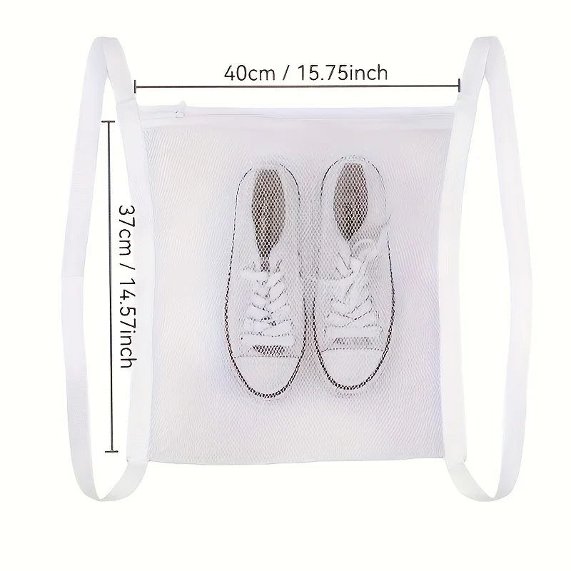 A white mesh bag with handles is shown, containing a pair of shoes for washing.