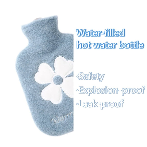 A light blue, water-filled hot water bottle with a white flower design.