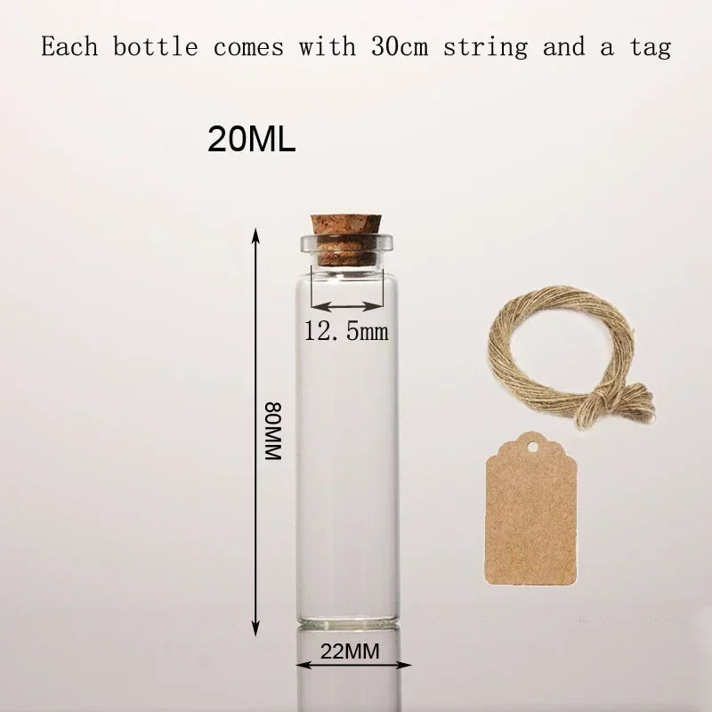 A clear glass bottle with a cork, measuring 22mm in diameter and 80mm in height, shown next to a brown tag.