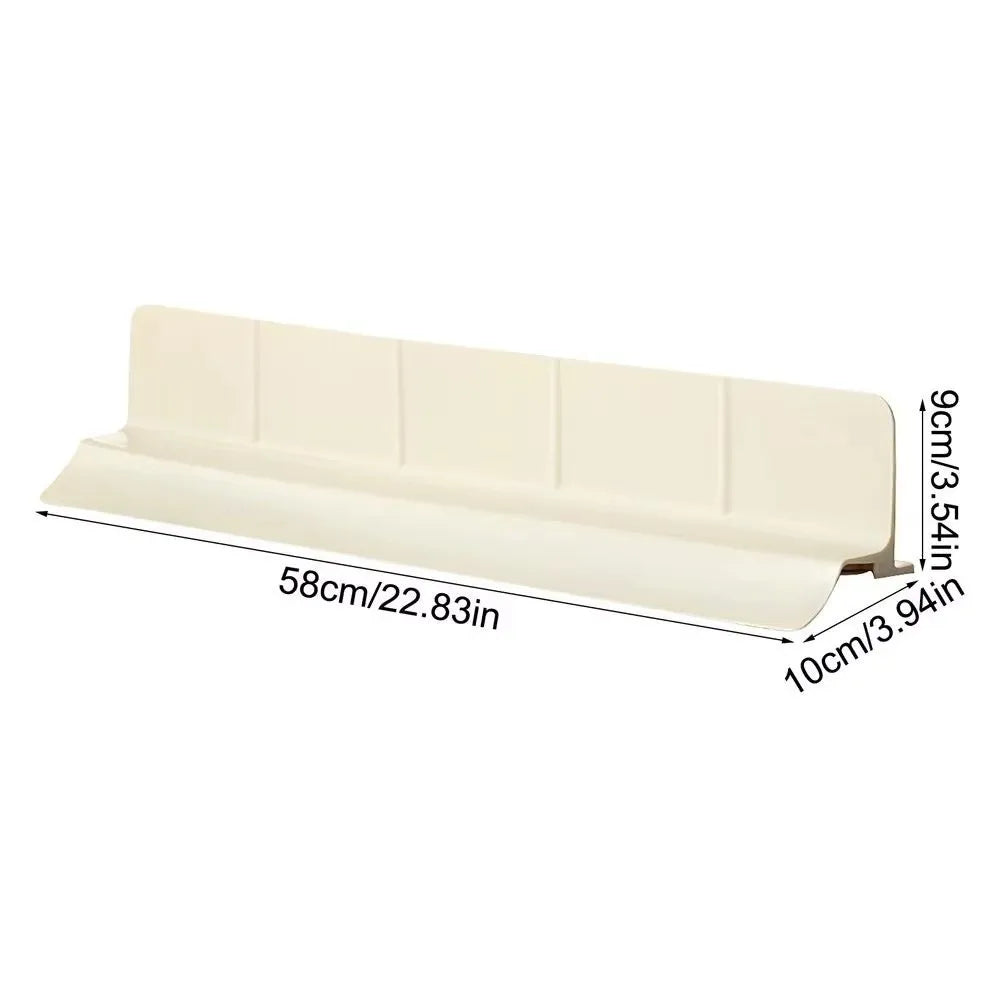 Beige Silikon-Spüle-Barriere mit mehreren Erhöhungen zum Schutz der Küche.