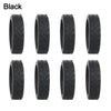 A set of black silicone luggage wheel protectors.
