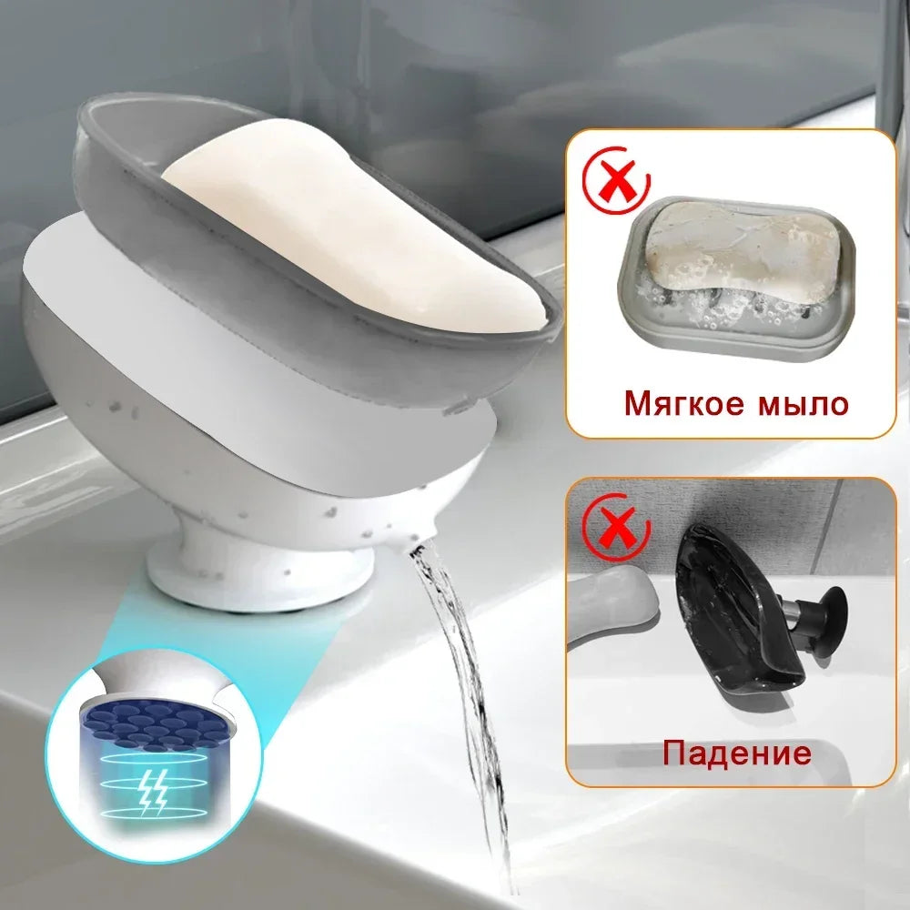 A heavy duty suction cup soap dish with a drainer is shown dispensing liquid soap into a sink.